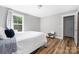 Bright bedroom with a window letting in light and neutral walls enhance the cozy feeling at 3902 Mcgee Point Rd, Terrell, NC 28682