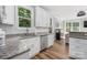 Bright kitchen with granite countertops, white cabinets, stainless steel appliances at 3902 Mcgee Point Rd, Terrell, NC 28682