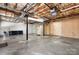 Spacious unfinished basement with concrete flooring and exposed ceiling for plenty of storage at 4007 Black Oak Rd, Hickory, NC 28602