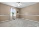 Bedroom with soft carpet, a ceiling fan and natural lighting at 4007 Black Oak Rd, Hickory, NC 28602