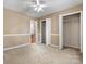 Bedroom featuring soft carpet, neutral paint and closet space at 4007 Black Oak Rd, Hickory, NC 28602