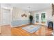 Bright dining area with hardwood floors, french doors, and stylish lighting at 4007 Black Oak Rd, Hickory, NC 28602