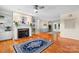Spacious living room featuring a cozy fireplace, hardwood floors, and natural light at 4007 Black Oak Rd, Hickory, NC 28602