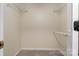 Walk-in closet with carpet flooring, built-in shelves and clothes rack at 4007 Black Oak Rd, Hickory, NC 28602