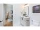 Elegant bathroom with a modern vanity, stylish fixtures, and ample natural light at 4203 Walker Rd, Charlotte, NC 28211