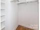 Spacious walk-in closet with ample shelving and organizational space at 4203 Walker Rd, Charlotte, NC 28211