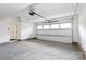 Spacious two-car garage with windows in the door at 4203 Walker Rd, Charlotte, NC 28211