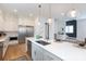 Stylish kitchen island with stainless steel appliances and ample storage space at 4203 Walker Rd, Charlotte, NC 28211