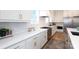 Well-appointed kitchen showcasing custom cabinetry, stainless appliances, and ample counter space at 4203 Walker Rd, Charlotte, NC 28211