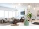 Open-concept living area showcasing a fireplace and a modern kitchen at 4203 Walker Rd, Charlotte, NC 28211