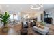 Spacious open-concept living room featuring a modern kitchen and cozy seating with natural light at 4203 Walker Rd, Charlotte, NC 28211
