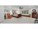 Airy main bedroom with a ceiling fan, natural light, and neutral decor, a serene retreat at 4644 Snow Dr, Harrisburg, NC 28075