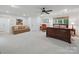 Large main bedroom offers ample space, natural light, and a comfortable seating area for relaxation at 4644 Snow Dr, Harrisburg, NC 28075