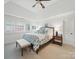 The main bedroom features a neutral color palette, vaulted ceiling and comfortable bedding at 4644 Snow Dr, Harrisburg, NC 28075