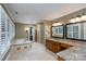 Bathroom featuring a soaking tub and granite-topped vanity at 4672 Snow Dr, Harrisburg, NC 28075
