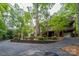Beautiful brick home with well-maintained landscaping and a spacious driveway at 4672 Snow Dr, Harrisburg, NC 28075