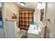 Cozy bathroom with neutral decor and coordinated accessories at 505 S Eastway Dr, Troutman, NC 28166