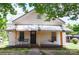 Inviting home exterior with a covered porch and comfortable seating at 505 S Eastway Dr, Troutman, NC 28166