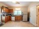 Functional kitchen with stainless steel appliances and tile flooring at 505 S Eastway Dr, Troutman, NC 28166