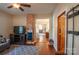 Comfortable living room features hardwood floors and a decorative brick column at 505 S Eastway Dr, Troutman, NC 28166