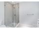 Bright bathroom features a glass enclosed shower with white subway tile at 5424 Doncaster Dr, Charlotte, NC 28211
