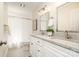 Bathroom featuring a dual sink vanity, granite countertops, and a shower with curtain at 5424 Doncaster Dr, Charlotte, NC 28211
