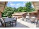 Spacious outdoor patio features multiple seating areas for entertaining guests at 5424 Doncaster Dr, Charlotte, NC 28211