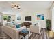 Staged living room with vaulted ceilings and hardwood floors at 5811 Rock Hollow Dr, Charlotte, NC 28212