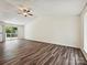 Spacious living room with vaulted ceilings and sliding doors to the exterior at 5811 Rock Hollow Dr, Charlotte, NC 28212