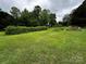Expansive backyard offers plenty of room for gardening, recreation, and outdoor entertaining at 6229 Mountain Grove Rd, Hickory, NC 28602