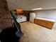 Basement kitchen with appliances, cabinets, and laminate countertops at 6229 Mountain Grove Rd, Hickory, NC 28602