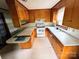 Functional kitchen with white appliances, ample counter space and natural light is ready for your personal touch at 6229 Mountain Grove Rd, Hickory, NC 28602