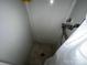 White shower stall features a curtain, grab bar, shower head, and a non-slip shower floor at 6229 Mountain Grove Rd, Hickory, NC 28602