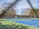 Well-maintained tennis court offers a great recreational opportunity for residents within the community at 714 Deerbrook Ln, Tega Cay, SC 29708