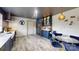 Stylish kitchen with stainless steel appliances, dark blue cabinets, and adjacent dining area at 751 Northbrook Iii School Rd, Vale, NC 28168