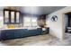 Cozy kitchen with dark blue cabinetry and an elegant farmhouse sink at 751 Northbrook Iii School Rd, Vale, NC 28168