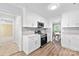 Eat-in kitchen showcasing modern appliances, sleek countertops, and ample natural light at 7528 Red Oak Ln, Charlotte, NC 28226