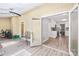 Open concept sunroom featuring views of the kitchen and backyard, perfect for relaxation at 7528 Red Oak Ln, Charlotte, NC 28226