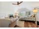 Inviting bedroom with a sitting area, hardwood floors, and plenty of natural light at 8109 Hawk Crest Ct, Charlotte, NC 28270
