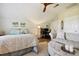 Spacious bedroom featuring a sitting area, hardwood floors, and abundant closet space at 8109 Hawk Crest Ct, Charlotte, NC 28270