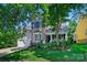 Charming two-story home with a stone facade, manicured lawn, and well-maintained landscaping at 8109 Hawk Crest Ct, Charlotte, NC 28270