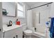 Bright bathroom featuring a walk-in shower, modern fixtures, and a framed mirror at 812 Kings Rd, Shelby, NC 28150