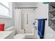 Accessible bathroom with walk-in shower, grab bars, and neutral color scheme at 812 Kings Rd, Shelby, NC 28150