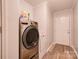 Bright laundry room equipped with modern stainless steel washer and dryer, adding convenience to household chores at 812 Kings Rd, Shelby, NC 28150