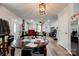 Open living area featuring wood-look flooring, a dining area, and a comfortable space at 812 Kings Rd, Shelby, NC 28150