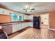 Functional kitchen with white cabinets, light countertops, and modern appliances at 8255 Castor Rd, Salisbury, NC 28146