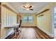 Cozy home office features hardwood floors and shelving at 8255 Castor Rd, Salisbury, NC 28146