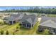 Aerial view of a home with a screened porch and well-manicured lawn at 9435 Liberty Hill Dr, Mint Hill, NC 28227