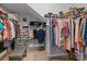 Well-organized walk-in closet with shelving and hanging racks, offering ample storage space at 9435 Liberty Hill Dr, Mint Hill, NC 28227