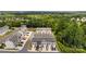Aerial view showcasing community townhomes surrounded by lush greenery at 999 Rushing Ln # 13, Fort Mill, SC 29715